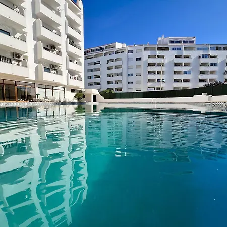 Town With Pool By Homing